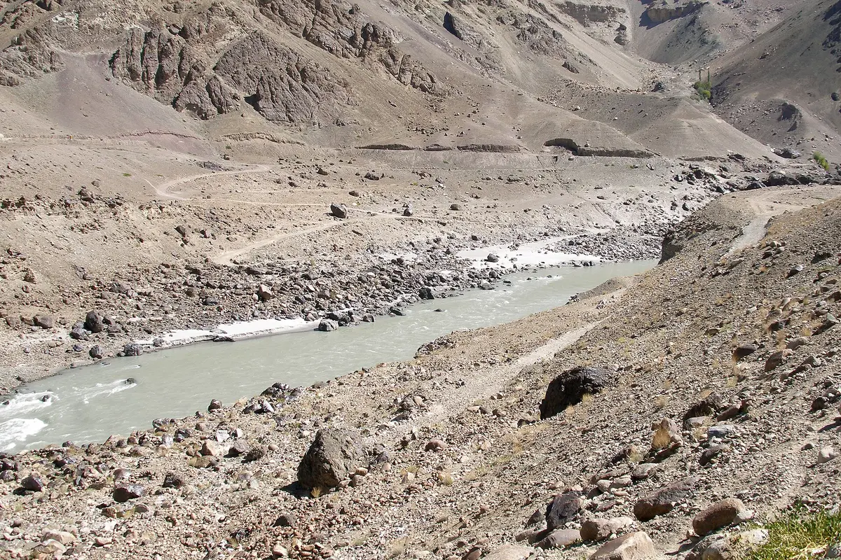The Indus river flowing through a valley in Ladakh