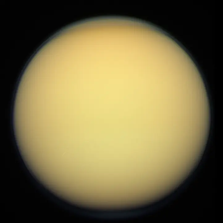 Titan: Cassini Reanalysis Points to a Slushy Interior